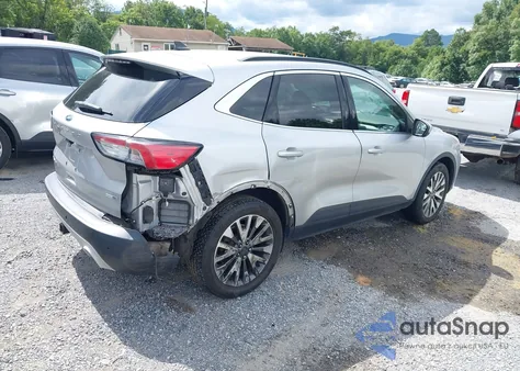 2020 Ford Escape Titanium z USA, uszkodzony, nr VIN 1FMCU9J97LUB17778